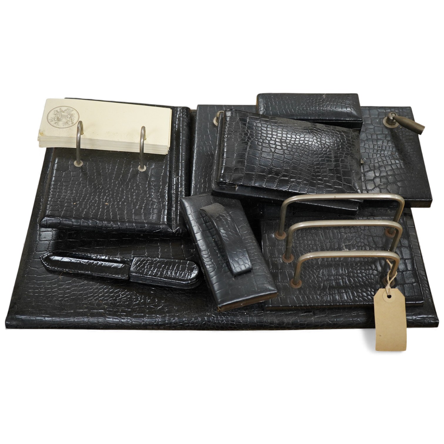 A seven-piece crocodile skin-effect desk set
